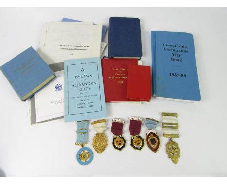 Masonic jewels for the Alexandra Lodge Long Sutton No 985, one silver gilt and blue enamel, together with year books, regulat