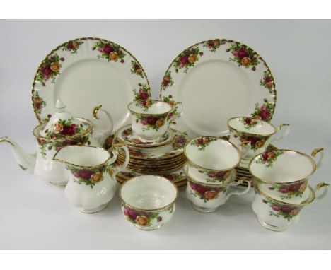 A Royal Albert porcelain part tea service, decorated in the Old Country Roses pattern, comprising teapot, cream jug, sugar bo