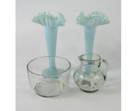 A pair of Victorian turquoise vaseline glass vases, with frilled rims, 14.5cm high, and a Mary Gregory clear glass cream jug 