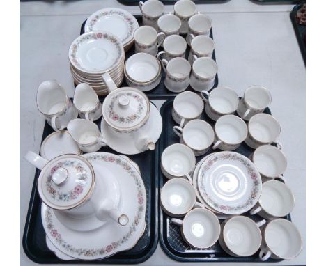 A Paragon porcelain part tea and coffee service, decorated in the Belinda pattern, comprising tea pot, coffee pot, three crea