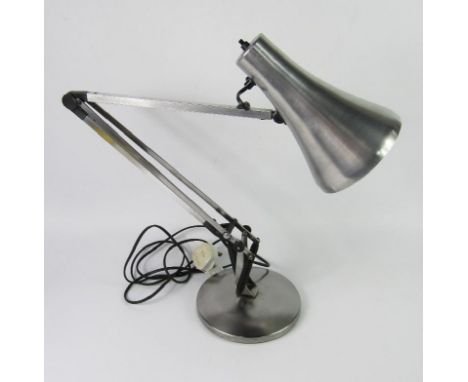 A polished steel anglepoise lamp, 88cm high.