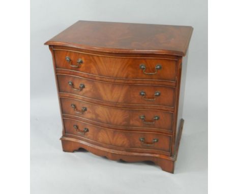 A serpentine mahogany chest of four long drawers, raised on bracket feet, 73.5cm x 46cm x 76cm.