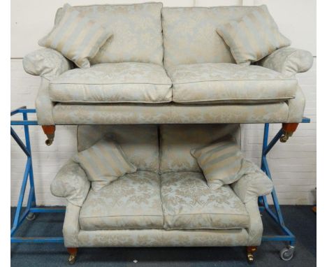 A Derwent Upholstery Ltd large two seater sofa, upholstered in Rien Magnolia fabric, 202cm long, and a matching two seater so