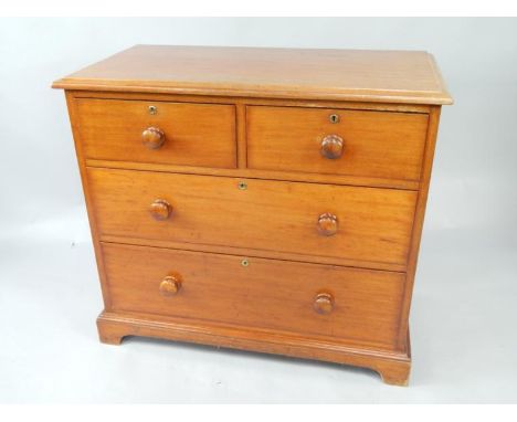 A Victorian mahogany chest of drawers, with two short and two long drawers, raised on bracket feet, 97.5cm x 49cm x 87.5cm.