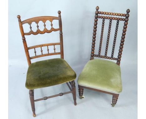 A Victorian rosewood bobbin turned nursing chair by Strathan, with overstuffed seat, raised on bobbin turned legs, on ceramic