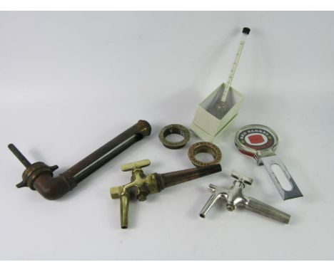 A group of Breweriana, comprising a Jackson hydrometer, Watney Red Barrel keg advertiser, Pontifex & sons thermometer, pair o
