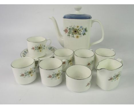 A Royal Doulton porcelain part coffee service, decorated in the Pastorale pattern, comprising coffee pot, cream jug, sugar bo