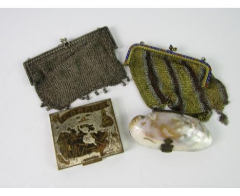 A white chain metal evening bag, stamped 800, tricolour mesh evening bag with enamel clasp set with two blue cabochons, a she