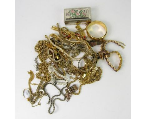 Gilt metal costume jewellery, including necklaces, pendants, bracelets and a bangle.