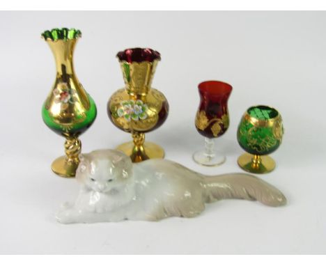 Two Murano glass vases, with gilt and enamel floral overlay, similar liqueur glass, and a ruby glass schooner gilt decorated 