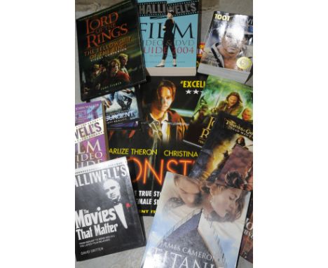 A large selection of film memorabilia and books including fliers and posters for various films including Insurgents, The Rove