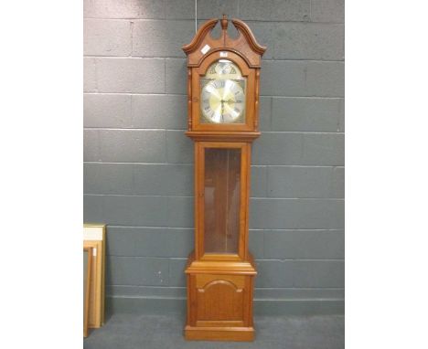 A reproduction longcase clock with broken swan neck pediment 202x 45x 26cm