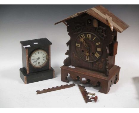 A late 19th century/early 20th century Black Forest cuckoo clock (A/F) and a marble and granite case clock (2)