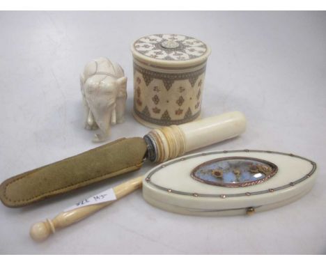 A small collection of ivory items to include a silver bladed apple corer, a George III needle case, lidded box etc (5)