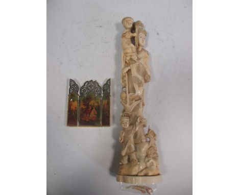 A Japanese ivory figural group together with a 19th century ivory triptych (2)