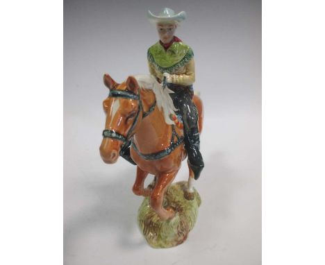 A Beswick model of a cowboy, 23cm high