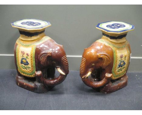 A pair of Far Eastern ceramic elephant plant stands, c. mid 20th century