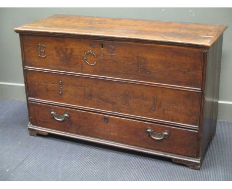An 18th century oak mule chest with stud work decoration "EWC R 1741", 77 x 124 x 52cm