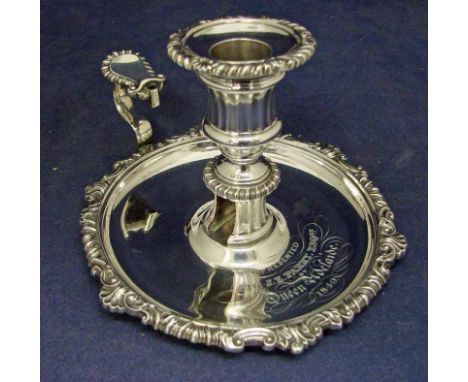 A George III silver Chamber Stick of typical circular form, urnular sconce with detachable drip pan, decorated with rope, she