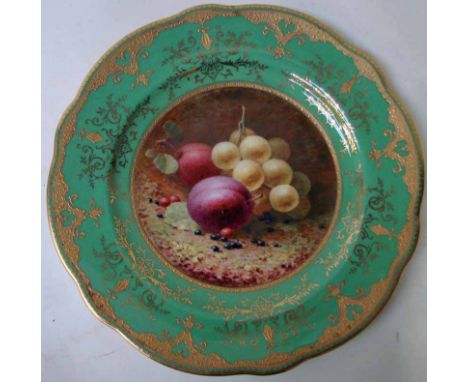 A Coalport china Cabinet Plate, early 20th century, centrally hand painted by F H Chivers with a still life of grapes, plums 