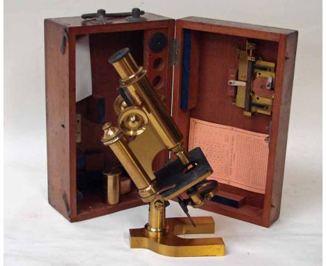 An early 20th century lacquered brass Monocular Compound Microscope by R and J Beck London, number 19184, rack and pinion coa
