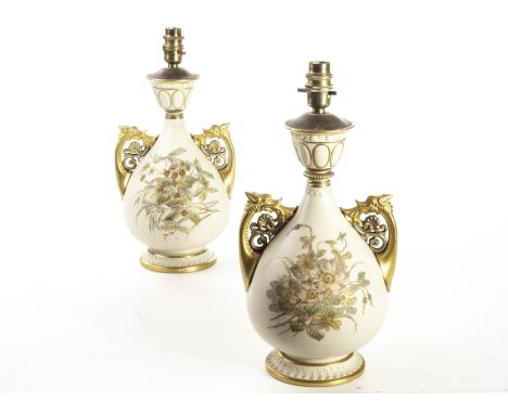 A pair of Worcester blush ivory vases with Alhambra style handle configuration, with puce marks for 1888, one decorated with 