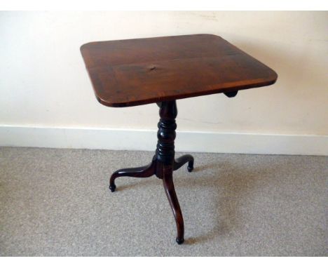 A 19th century mahogany tilt top side table, on turned support with tripod base, AF, top blown and damaged in places