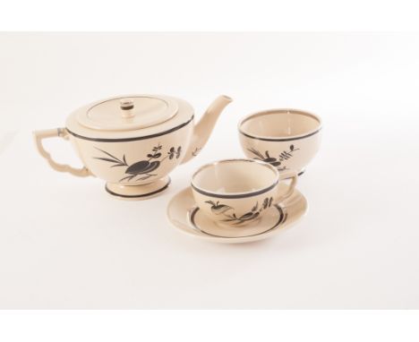 A Danish pottery tea set, the neutrally glazed pottery decorated with black flowers and heightened with chromed design, compr