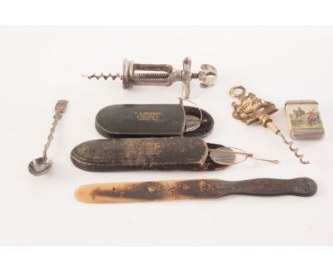 a vintage French mechanical corkscrew, together with a Japanese horn page turner with gilt decoration, two pairs of vintage s