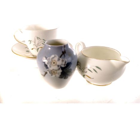 A small selection of Wedgwood ceramics, including a cup and  fiver saucers and a milk jug, together with a Copenhagen and B&G