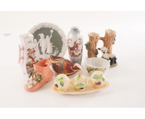 A Royal Crown Derby grouse paperweight, having silver button, together with a Carlton Ware cruet, a Jasperware style plate an