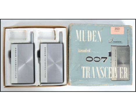A vintage 1960's Muden Model 007 pair of walkie talkies - Portable 3 transistor radio's complete in the original box