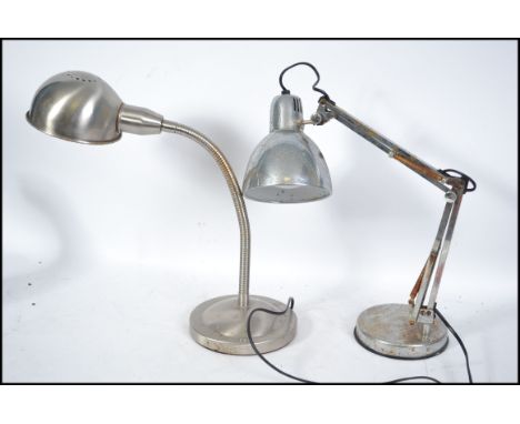 A vintage polished steel 20th century polished steel gooseneck anglepoise lamp with half moon shade together with another ang