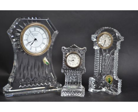 Two Waterford crystal cut glass miniature mantle clocks along with a Galway Crystal mantle clock to include column shaped. ba