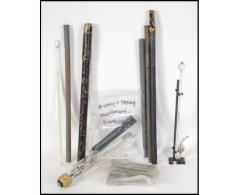 A collection of vintage 20th century glass mercury filled thermometers many in original cases. The tallest measures 34cm high