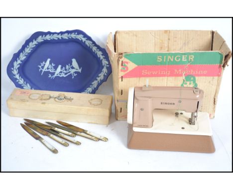 A vintage childs ' sewhandy ' Singer sewing machine in box together with a piece of Wedgwood Jasperware and a set of vintage 