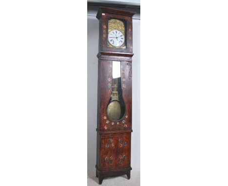 A 19th century French longcase / comptoise grandfather longcase clock. The white enamel dial with subsiduary dial and faceted