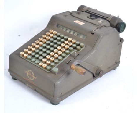 A vintage early 20th century National comptometer - adding machine with pull handle, coloured handles etc in mottled metal ca