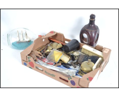 A mixed lot to include ship in a bottle, vintage brushes. treen elephant etc. Please see images