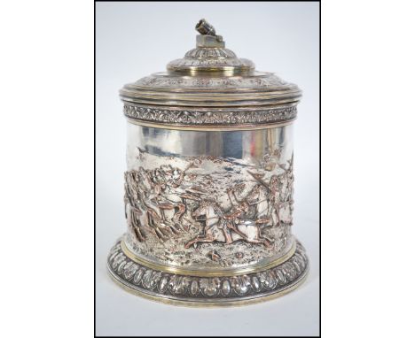 A 19th century Elkington electro-type silver plated biscuit box. Cast in relief with the charge of the light brigade. Stamped