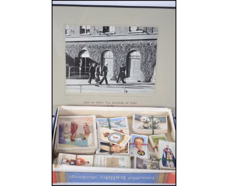 A collection of vintage cigarette cards containing many subjects together with a photograph of the Duchess Of Kent
