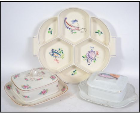 A large Poole Pottery ceramic&nbsp;hor d'oeuvres sectional dish together with 2 vintage Staffordshire sardine dishes, one wit