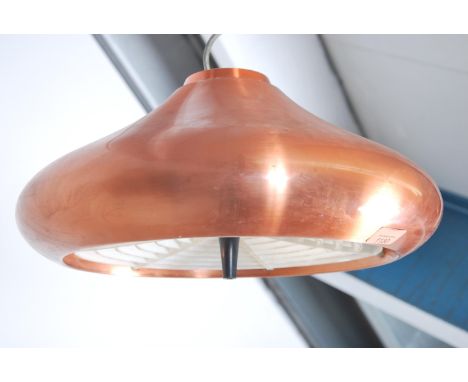 A 20th century retro UFO hanging ceiling light shade in a rose gold finish.&nbsp;