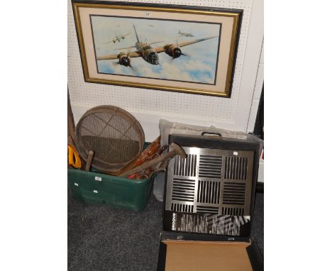 A contemporary wall hanging Groove CD rack, desinged by Frank Kerdl;  others (4);  a World War II bomber plane print
