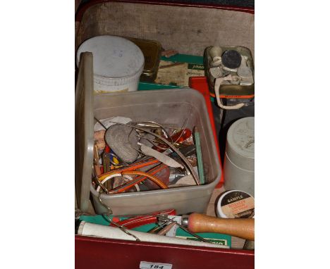 A case containing jewellery making tools , silver wire; etc 