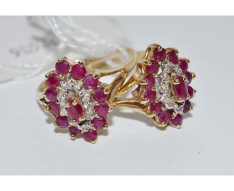 A ruby coloured stone and clear stone chip navette shaped cluster ring, yellow metal shank;  another (2)