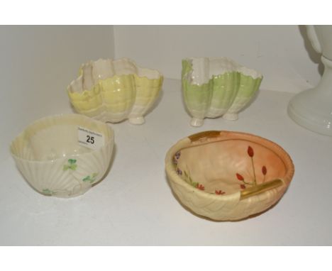 A Worcester blush ivory, basket, gilt decorated handles; a pair of Royal Worcester baskets; a Belleek sugar bowl (4)