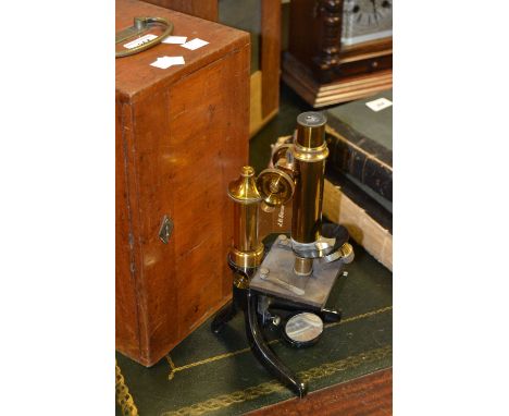 An E. Leitz Wetzlar lacquered microscope, cased, No. 61919