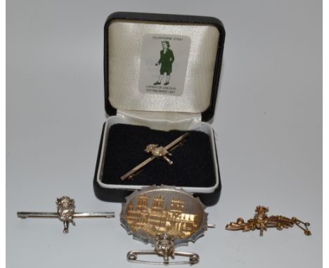 Jewellery - a 9ct gold Lincoln Imp tie pin, 1.6g ;  others silver;  a silver panel brooch, engraved with Lincoln Cathedral (5