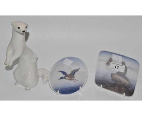 A Russian ceramic model of a winter stoat; a Royal Copenhagen pin dish painted with a mallard; another (3)